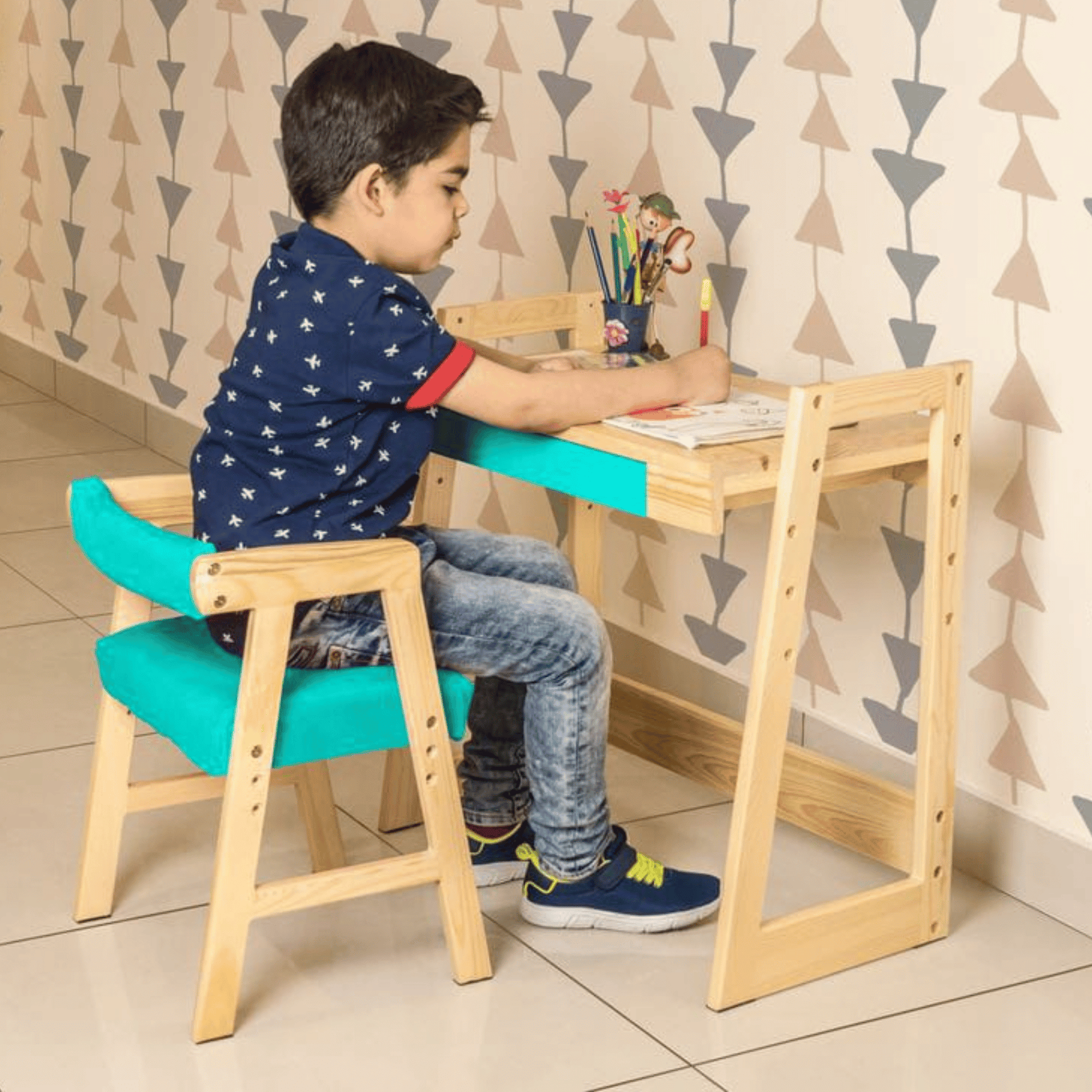Kid studying at Sheesham wood study table and chair set – premium children furniture by AB Homes Pakistan